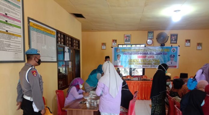 Kanit Provos Polsek Penrang Beri Himbauan Agar Warga Wajib Pakai Masker Dan Ikut Vaksinasi